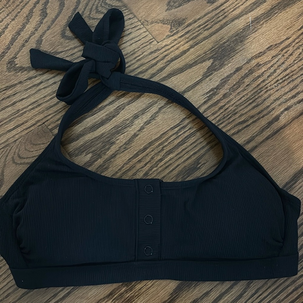 Black halter bikini top with buttons down the front in size M
